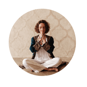 Woman Doing Yoga In Lotus Pose At Home