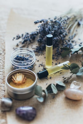 lavender essential oil with fresh lavender sprigs